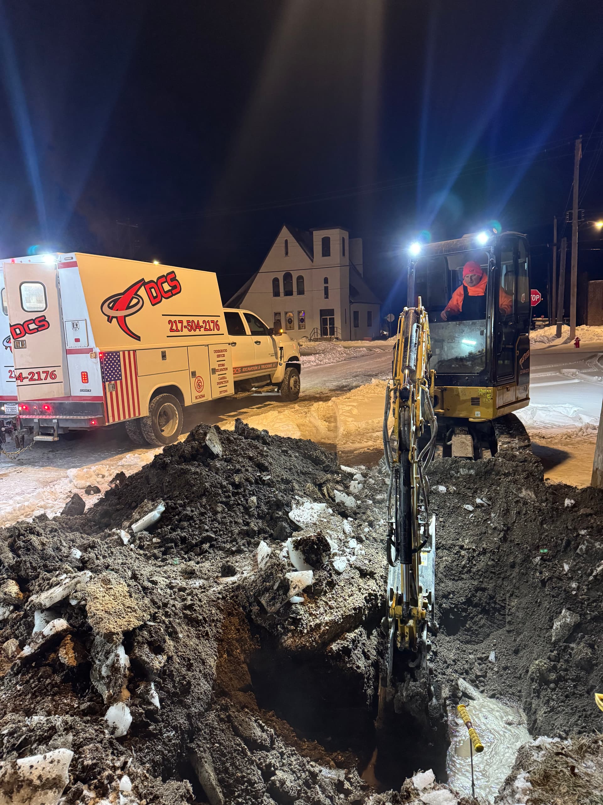 Late Night Water Main Repairs in Snowy Conditions